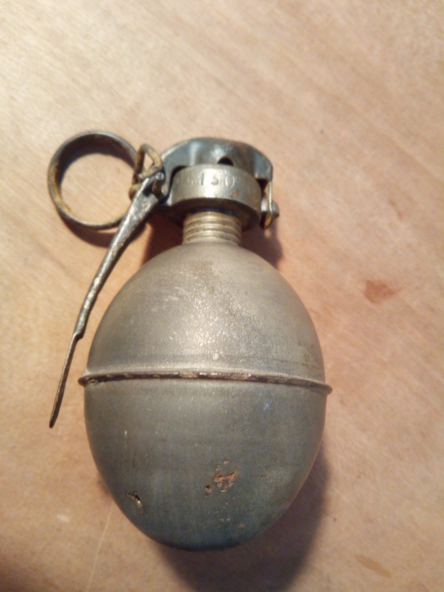 At first glance this looks like some unremarkable modern grenade. Closer inspections reveals something over 100 years old. 
This is a #WW1 French OF1 Grenade made between 1915-1917.
OF1 stands for Grenade Offensive No. 1 The fuze is a Brillant Model 1916 made by ECP