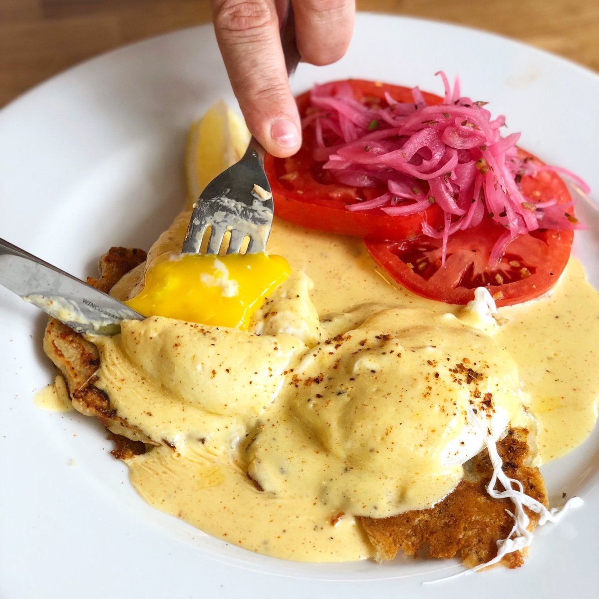 Digging into this #ConchCake #EggsBenedict 🍳🐚🍳 with <a href="/OLDBAYSeasoning/">OLD BAY</a> hollandaise at <a href="/EllasOysterBar/">Ella</a> brunch. #mmtm #yolkporn