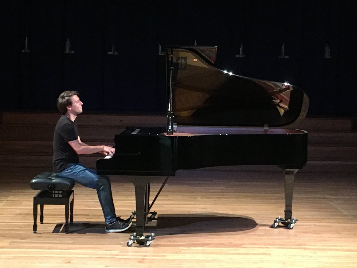 LintonMusSeries's tweet photo. Vitaly Pisarenko warming up before his phenomenal recital. We have lighting at last! #vitalypisarenko #pianorecital #lintonmusicseries #cambridge #atmosphere #piano #classicalconcert #linton #virtuoso #rachmaninov #prokofiev #debussy #liszt https://t.co/4pfUByoQ6j