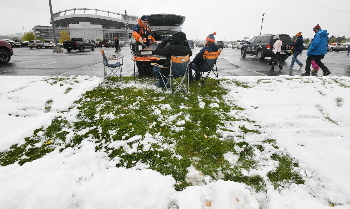 jerileebennett's tweet photo. Hardy Broncos fans clear a patch in the green grass to tailgate 2 hours before the game @CSGazetteSports https://t.co/q4gq71B8yb