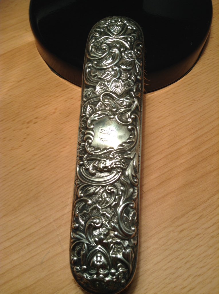 Amazing quality craftsmanship in this late 19th century solid silver clothes brush