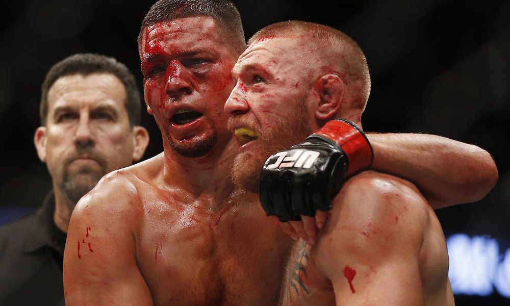 EoinBizzle's tweet photo. @JoeBrolly1993 here's something journalists always want to ignore. The respectful side of MMA. Two warriors have a bitter feud leading up to the fight, have a fantastic five round war and can hug it out and leave it all in the cage. @John_Kavanagh @UFC #UFC229 #UFC202 https://t.co/ERVuG7XGPS