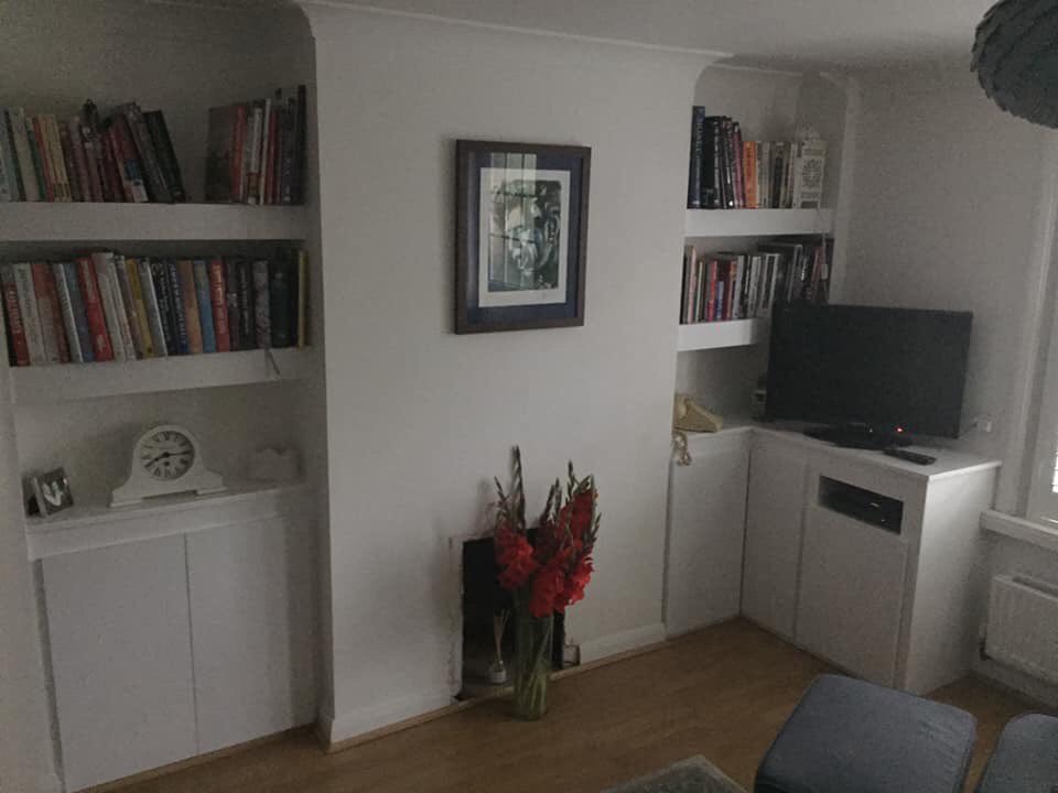 Bespoke shelving and TV unit created. Fully painted to satinwood finish.