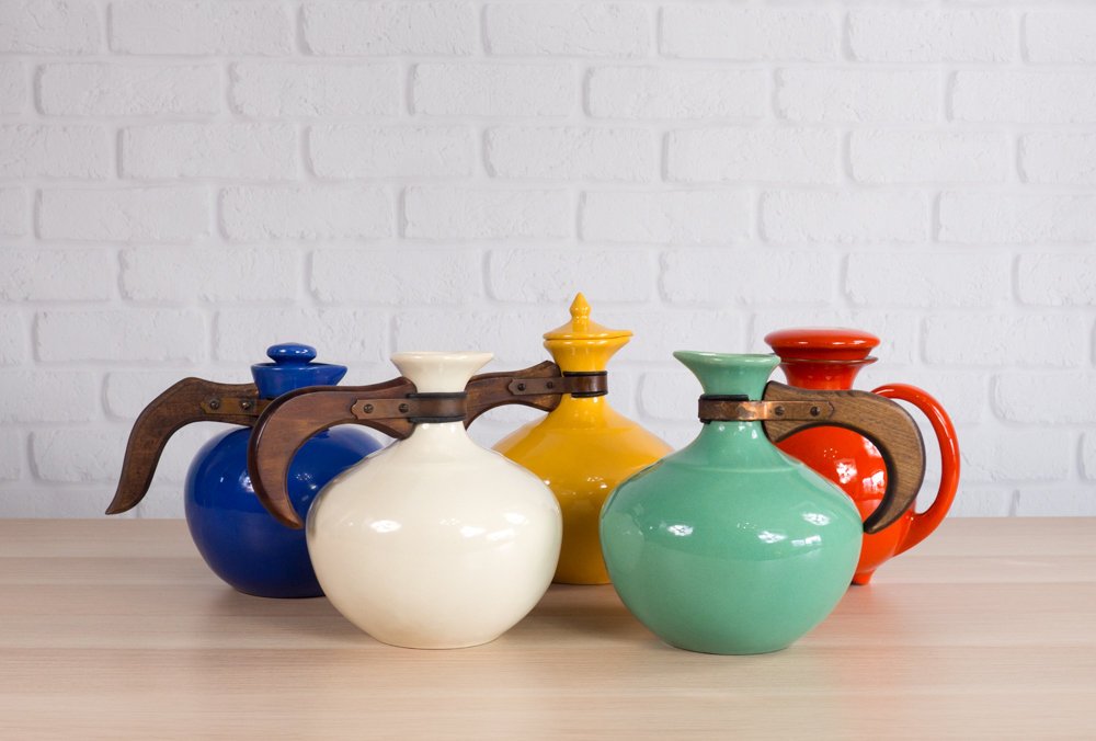 FFVintage's tweet photo. Bauer and other California pottery pitchers in bright, bold colors make quite a statement when displayed together! #bauerpottery #californiapottery #midcenturymodern https://t.co/lq8uD74CcE