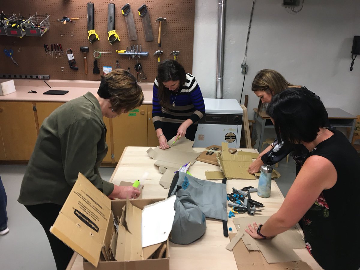 TLDSBThompson's tweet photo. Alexandra teachers trying a MakeDo cardboard challenge to build a 3D prism at the start of our staff meeting. #royalvalues #WorkHard #BeBrave @TLDSB_EE https://t.co/TSJttWTuSI