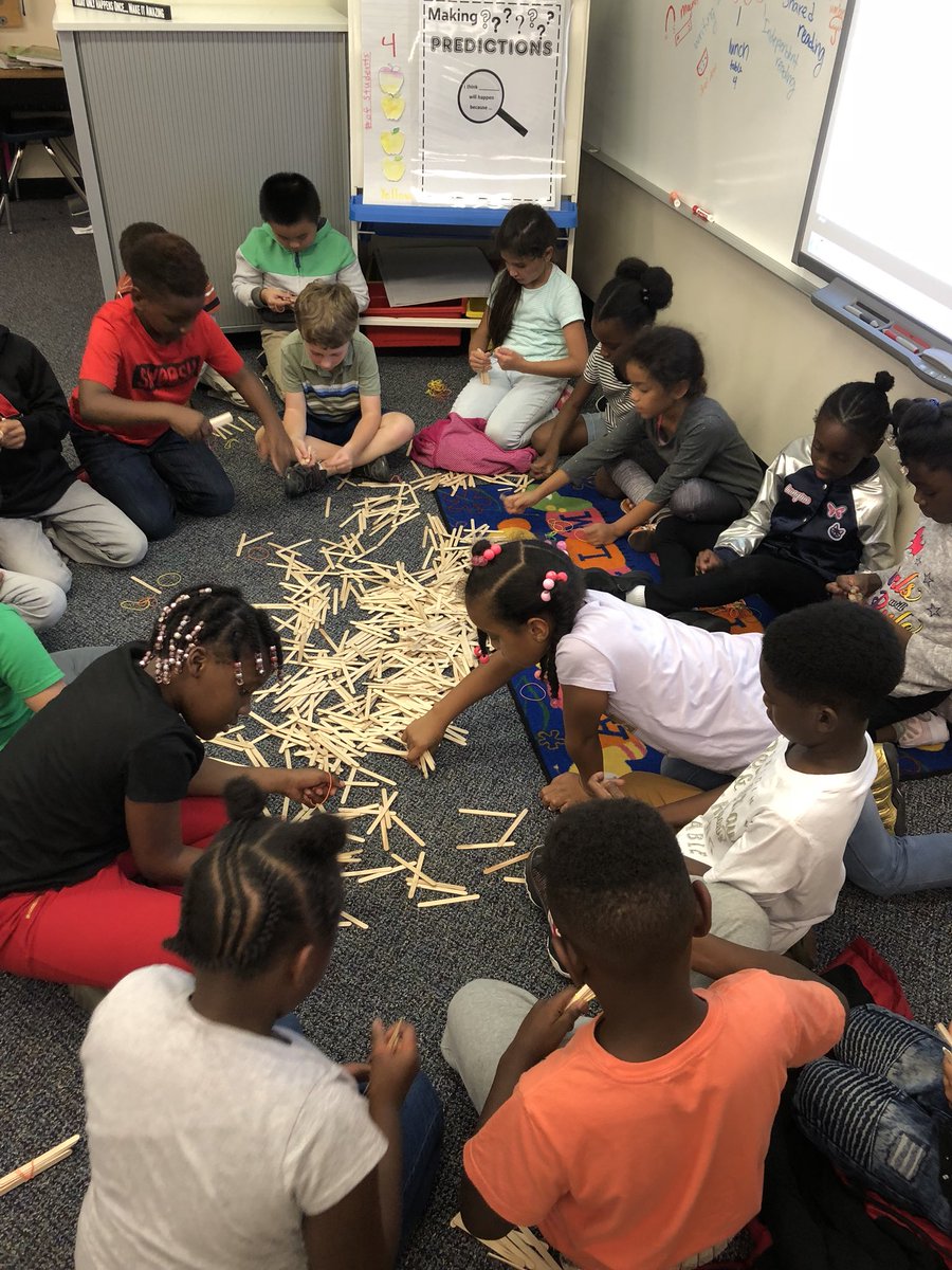 Second grade is learning about place value today in math. Bundling 1,000 popsicle sticks!