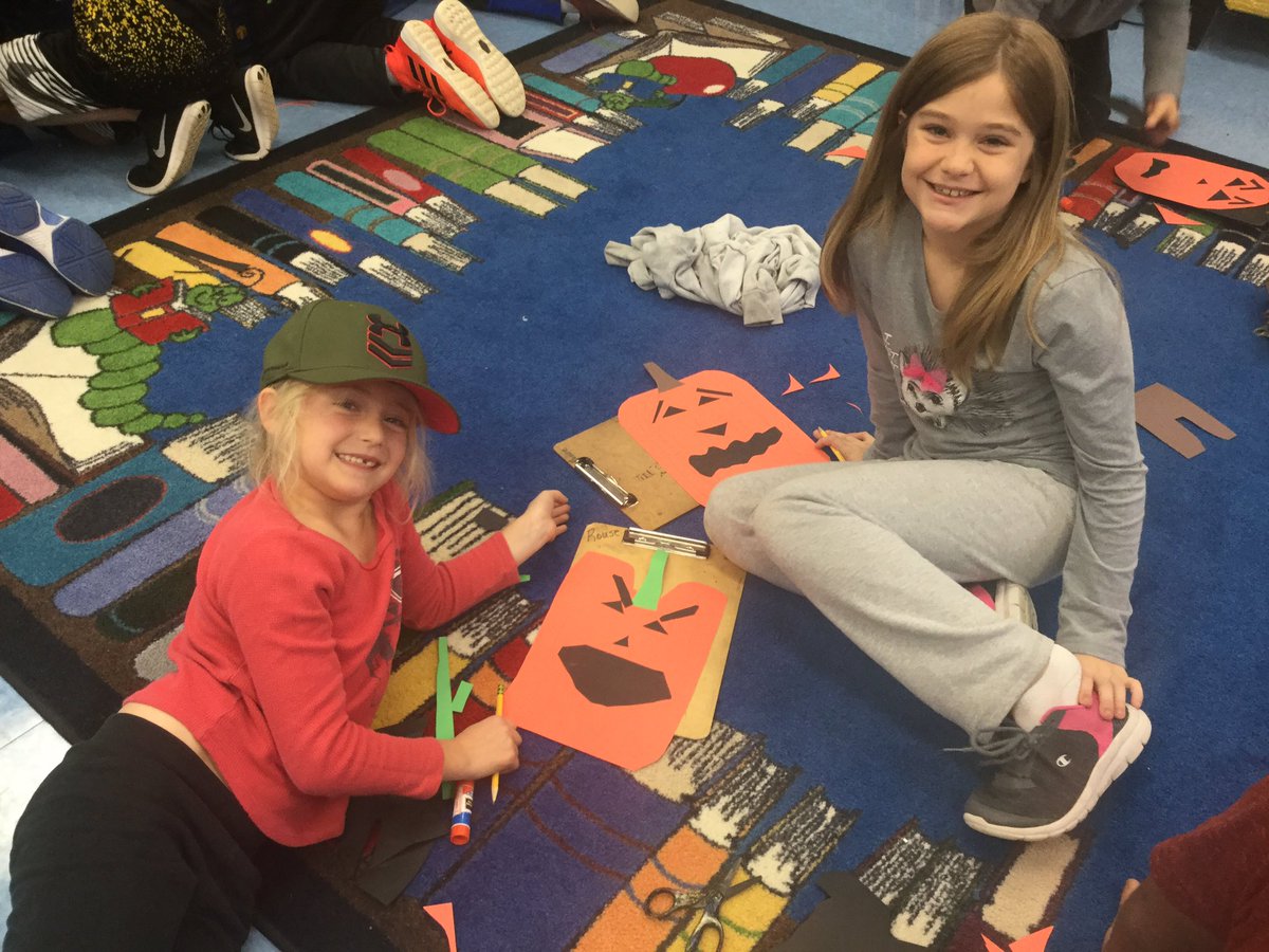TeamNunamaker's tweet photo. Making jack-o-lantern glyphs with our buddies in Mrs Knutson’s class! We are all different! #CPSBest #cpsmillcreek https://t.co/6CJz549OT9