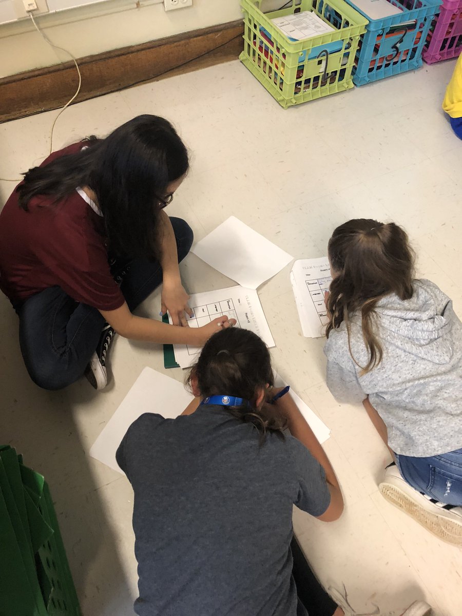 MsGisWRITEhere's tweet photo. How do our growing writers analyze poetry? They SLAM 'em, looking for structure, language, affect, and meaning! Here are our students, partnered up, slammin' a poem of their choice during the close-out of Immersion! https://t.co/QnNLK7aN6e