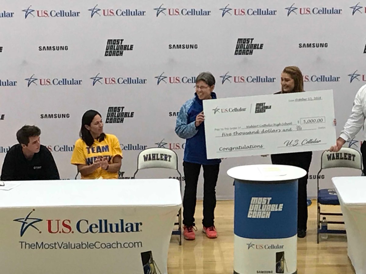HolyFamilyDBQ's tweet photo. Wahlert Tennis Coach Julie Westercamp ‘73 was just presented with a $5000 check to Wahlert for making it to the top 15 in the Most Valuable Coach contest. Keep the votes coming for a chance at another $50K plus. VOTE EVERY DAY at: https://t.co/yIoIUS9tpo. https://t.co/rqDKf53fhS