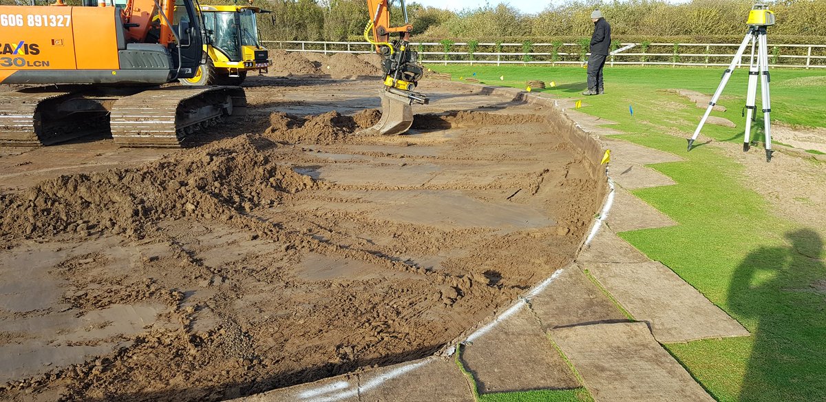 CaldygcGreens's tweet photo. George coring out the 10th while the boys spread #Trackmat, material being used to soften the slow in front of the 3rd white tee. With a raised walkway from back of the green to the base of the ramp. Should help move the water that accumulates there. #improvethebadbits https://t.co/K2nsC6tg4O