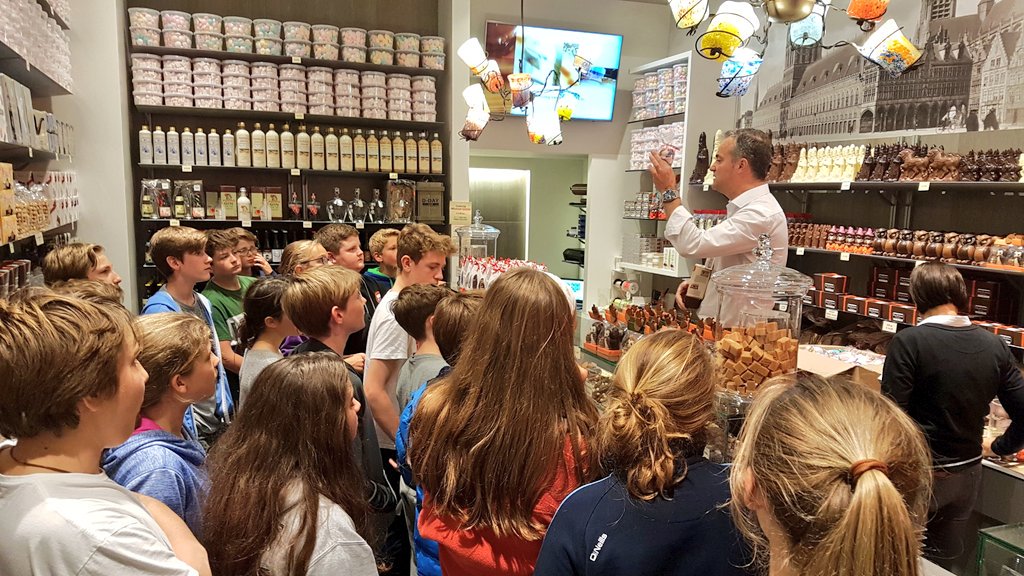 KSBHistory's tweet photo. What do you do when you have 70 @KingsBruton pupils in Belgium? Visit the chocolate shop of course! #HugeQueue #ThisShopIsRakingItIn https://t.co/BC3ZTFUWUz