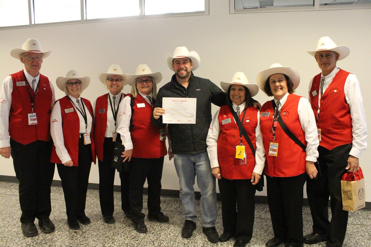 Realleadernow's tweet photo. @DayOneDrew is in town! The #whitehatyyc volunteers made his dreams come true with an official welcome. 
We are looking forward to hearing you speak tomorrow at the Real Leadership Conference! #realleader2018 #yycbuzz #yycnow https://t.co/7qJh6Ysfx4