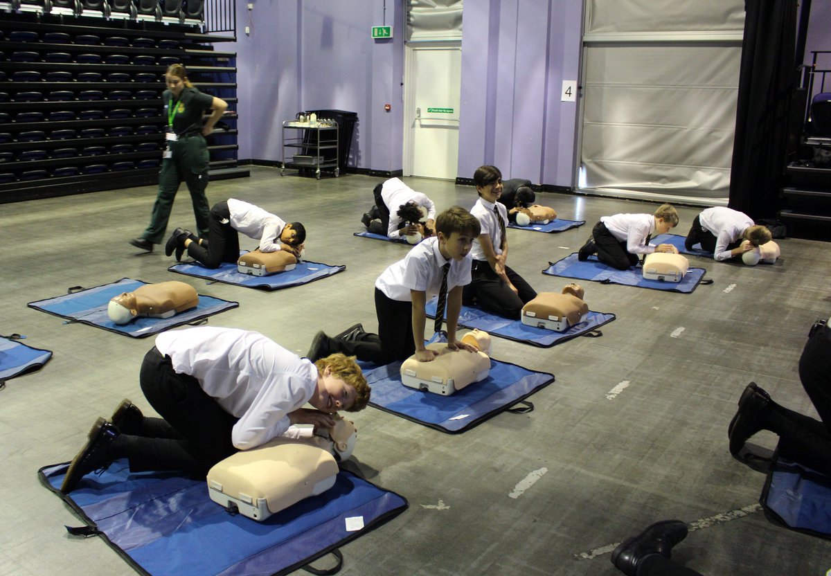 QEGSYorkshire's tweet photo. Our Y8 boys had a very busy morning for #RestartAHeartDay. ❤️ Thank you @YorksAmbulance for the CPR Training. Well done boys- great effort from you all. #Minutesmatter #RAH2018 #CPRSavesLives @TheBHF #MadeinQEGS #firstaid https://t.co/ReHJDJxz5E