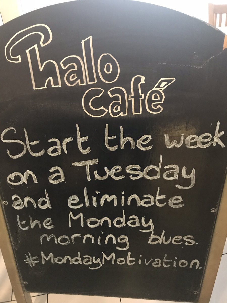 Blackboard sign outside Halo Café. Start the week on a Tuesday and eliminate the Monday morning blues.