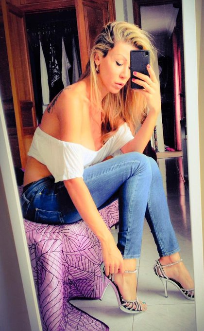 Getting dressed for this beautiful day, I love my jeans and heels..who would like to see me on a chat