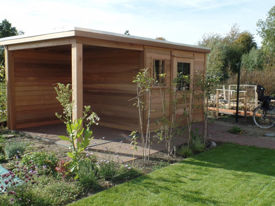 Lekker efficient tuinhuis met luifel geplaatst in Zaltbommel.prinstuinhuisjes.nl/tuinhuisjes/Tu…