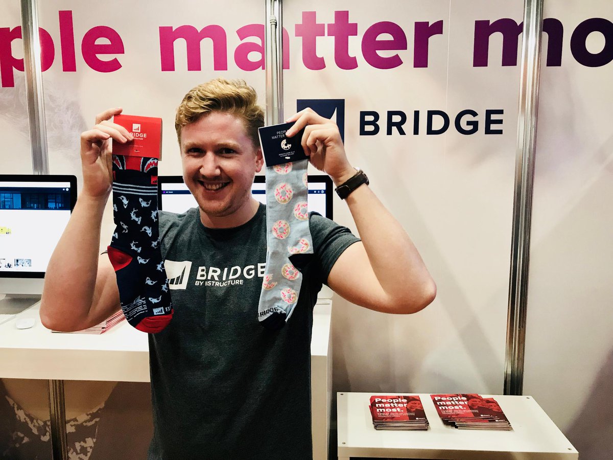 GetBridge's tweet photo. Donuts or sharks? Your pick! Get your pair of Bridge socks at #WOL18, stand D190. #WOL #WOLCE @Learn_EventsUK https://t.co/u25XIw0RgR