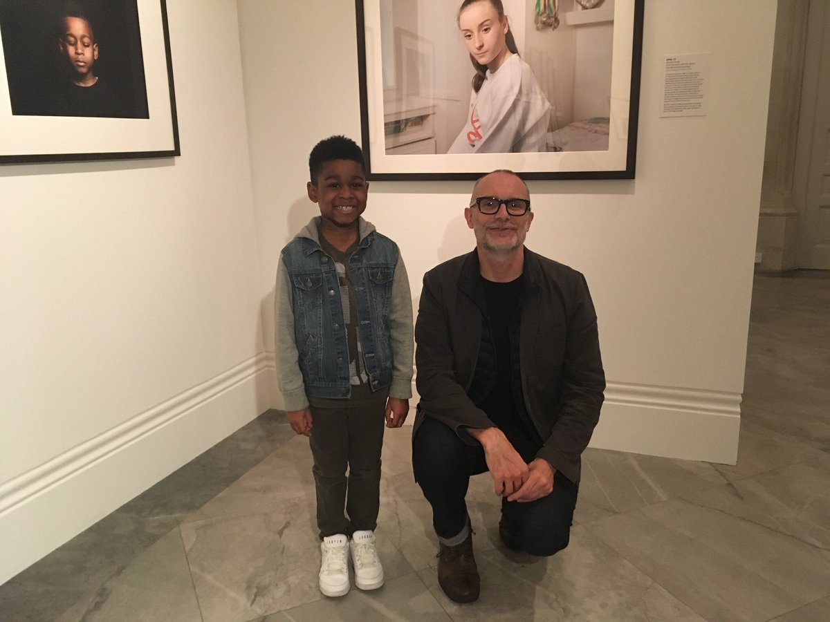 richardansett's tweet photo. ITV London news tonight at 6pm 8 year old Danel a survivor from #GrenfellTower is reunited with his portrait @NPGLondon #TWPP18 (Picture of me and Danel courtesy of his brother Amiel). Please RT! https://t.co/bJiq5k7gxs