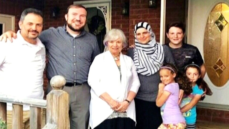 Meanwhile in Canada:

A small town in Ontario raised enough money to sponsor a family of five Syrian refugees.  When they arrived, neighbors gave them furniture and clothing, but they didn't have a place to stay.

 So the Mayor lent them his own home and moved in with his mother.