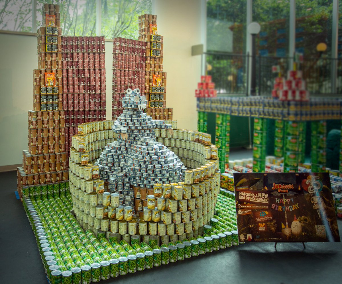 cuhaci_peterson's tweet photo. Our 2018 @CanstructionORL team had a blast building  Jurassic Park inspired gates with a baby dinosaur "Hatching an era of no more hunger" over weekend. 

Please help us win "People's Choice" by clicking the link below and liking our photo on Facebook! https://t.co/WGaTDmomh5 https://t.co/vz8jr93tO4