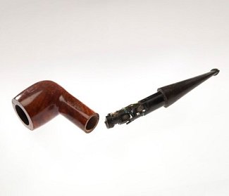 Radio receiver concealed in a pipe.