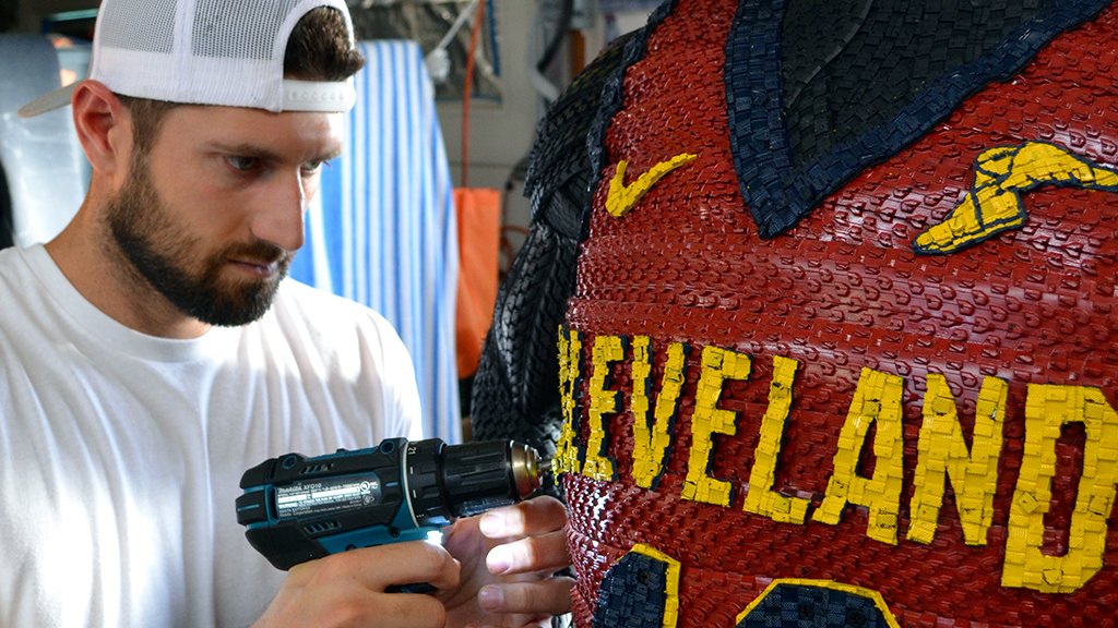 goodyear's tweet photo. It takes a one-of-a-kind artist to create tire art. Check out Blake McFarland’s newest @cavs piece for Sunday’s home opener. https://t.co/xxHPQzLgdz