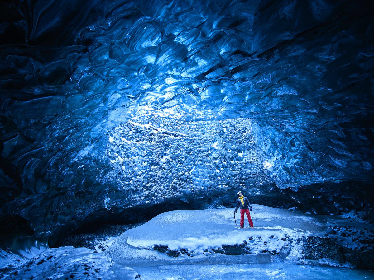 standoutphotoev's tweet photo. The ice caves underneath the Vatnajokull Glacier in Iceland are as beautiful as they are dangerous. Featured in this photo is the guide I have been using to explore the wondrous caverns for years. With it being a pre-season ice... Read more on IG #andreiduman #standoutphotoevents https://t.co/6pvXOoLwCM