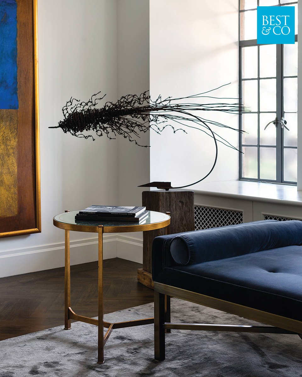 It’s so exciting when clients have unique art piece that to work with. The ultra modern decor and gold accents chosen play off this contemporary piece so well!