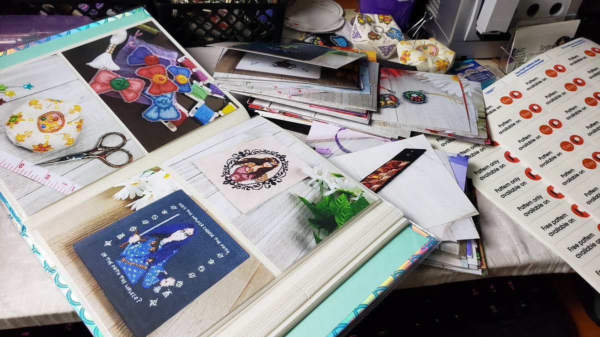 sirithre's tweet photo. Last minute putting together a photo album of all the #CrossStitch patterns available on my Patreon / Etsy, so those checking out my booth at TwitchCon can leaf through them. There's so many more patterns than I had realized! I had to upgrade to a larger photo album! https://t.co/5tL5Xmy4uZ