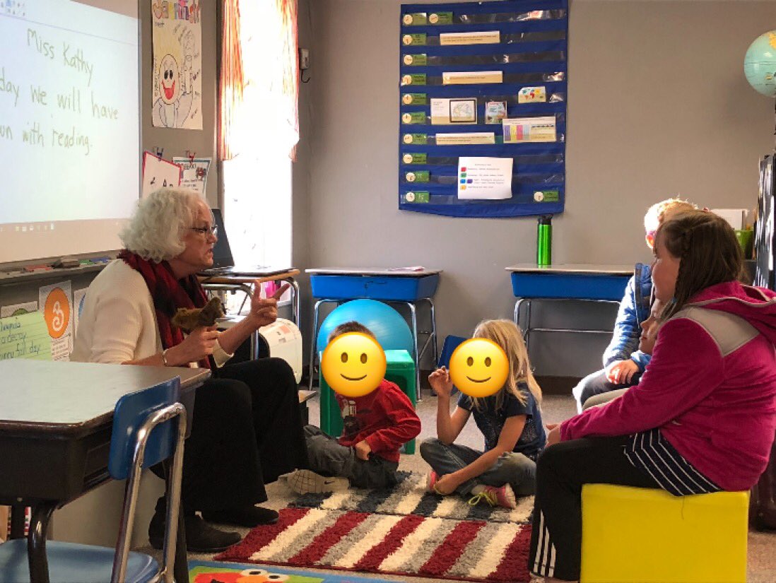 How to make reading fun?  Read with a puppet! @AmericanReading coach Kathy Jones models reading with a puppet and the student follows suit @Converse1SD rural school Shawnee #readingengagement