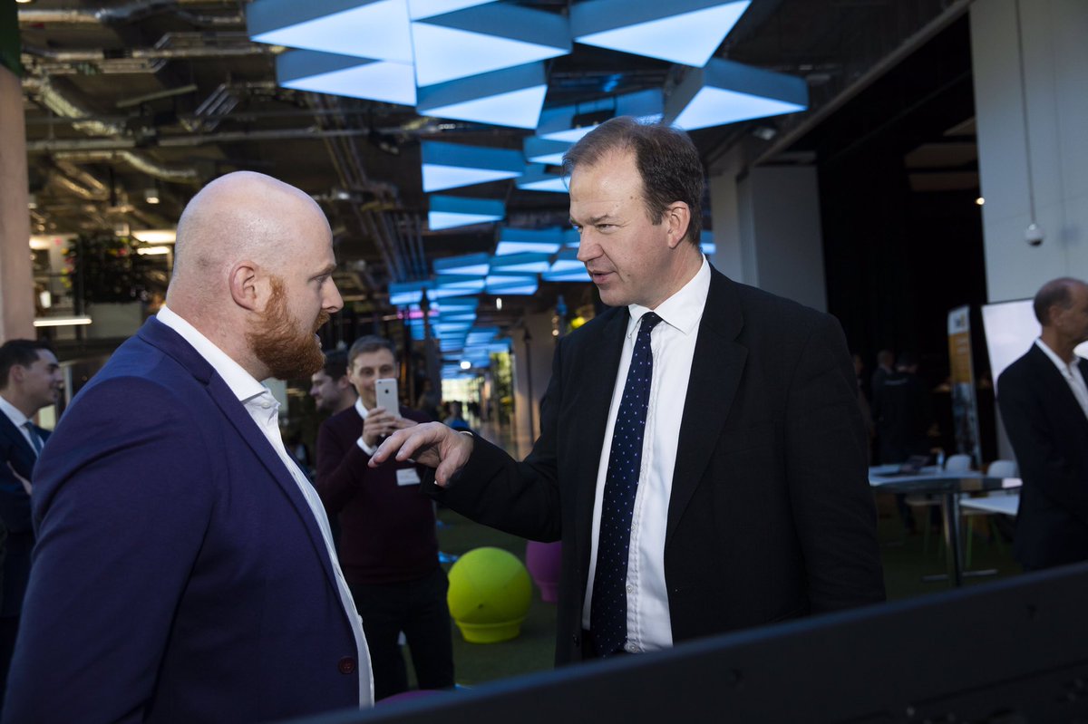 SMMT's tweet photo. Future Mobility Minister @Jesse_Norman talks to exhibitors at the SMMT #FutureMobilityChallenge about their automotive innovation and mobility solutions https://t.co/piIiN4qh0t https://t.co/wCRjNVQ2rZ