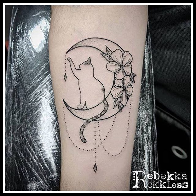 Cat and moon tattoo on the ankle