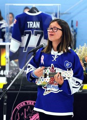 ETGuardian's tweet photo. ICYMI: The #Etobicoke Dolphins retired #77 during tearful tribute to Abbey Tran over the weekend #AT77 https://t.co/qM5efez2l3 https://t.co/DXchIAdRoi