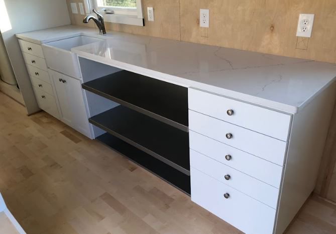 seattletinyhome's tweet photo. Custom built cabinets with countertops of your choice... at SeattleTiny homes, we build YOUR dream.  #tinyhouse #customtinyhome https://t.co/mSsm9Hgthb