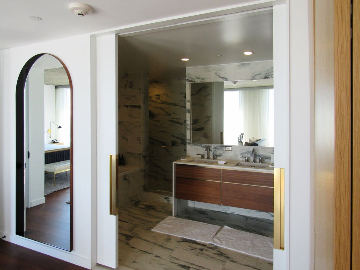 cavityslidersus's tweet photo. The Jeremy West Hollywood hotel is the newest kid on the Sunset Strip. This one breathes luxury so naturally, they decided to step their game up with their pocket doors. Featured here are the bi-parting SofStop units of the suites @SOM_Design @SuffolkBuilds https://t.co/yTuebe05R4