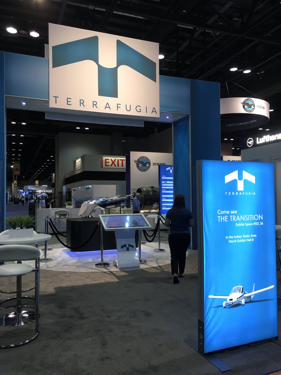TerrafugiaInc's tweet photo. Stop by #NBAA18 booth 3134 to talk with #Terrafugia team members, see the scale model and hologram of our #eVTOL concept TF2. #DrivenToFly #transportation #aviation #NBAA2018 #travel #mobility #pilots #technology #futuristic #FlyingCars #planes #geely #rebrand https://t.co/SE3ecOulFD