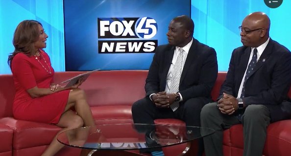 GilmanSchool's tweet photo. Malcolm Ruff '02 and Tim Holley '77 were interviewed on Baltimore's Fox45 about this weekend's celebration of the 50th anniversary of Gilman's first black alumni. Interview and celebration details: https://t.co/B3jeZgp68l https://t.co/yJ3sbVDSfb