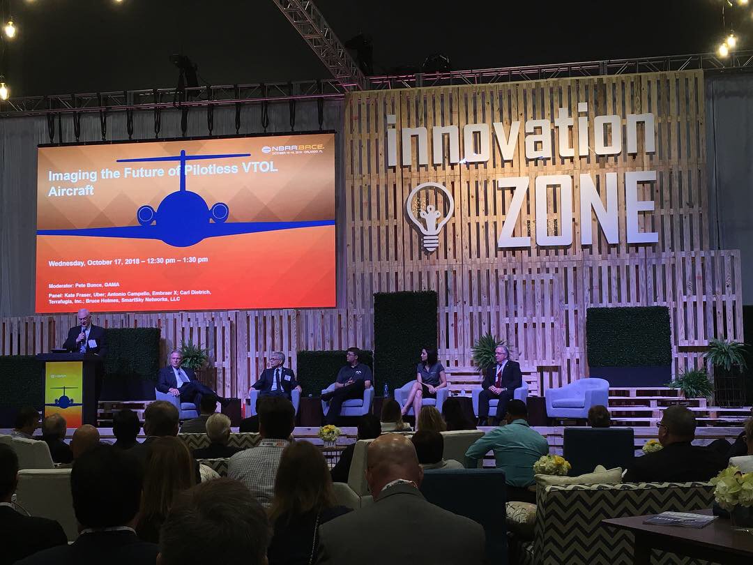TerrafugiaInc's tweet photo. #Terrafugia CTO and Co-Founder, Carl Dietrich, on panel at #NBAA18 to discuss the future of pilotless VTOL technology. #VTOL #pilotless #future #driventofly #flyingcars #aircraft #pilots #transportation #mobility #geely #airmobility #technology https://t.co/rXYCh6BAUo