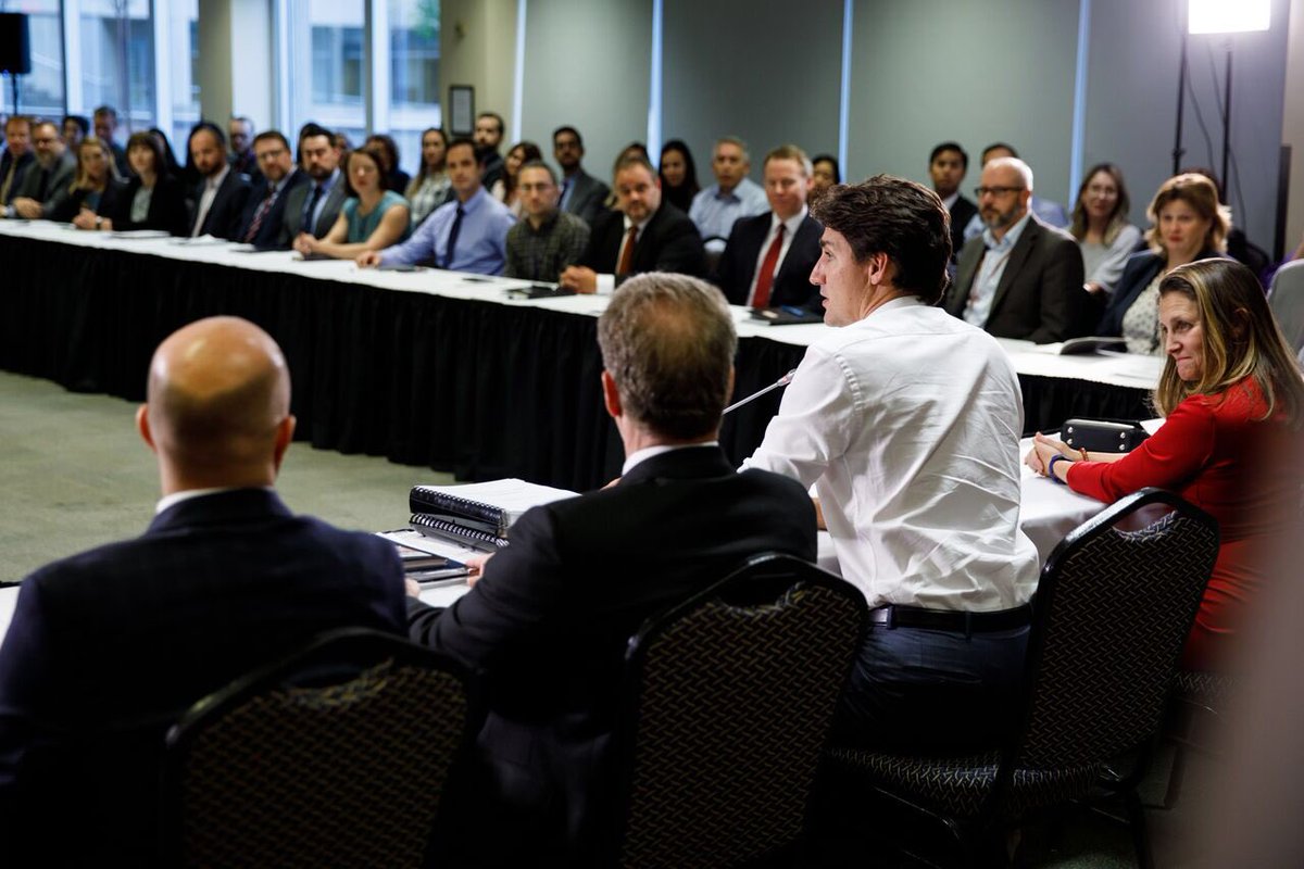 JustinTrudeau's tweet photo. Canada’s trade negotiators put in long hours for a long time to help negotiate the USMCA. They went above &amp; beyond to get a good deal for Canadians, and today we said thanks. https://t.co/kHKTWZpjyU