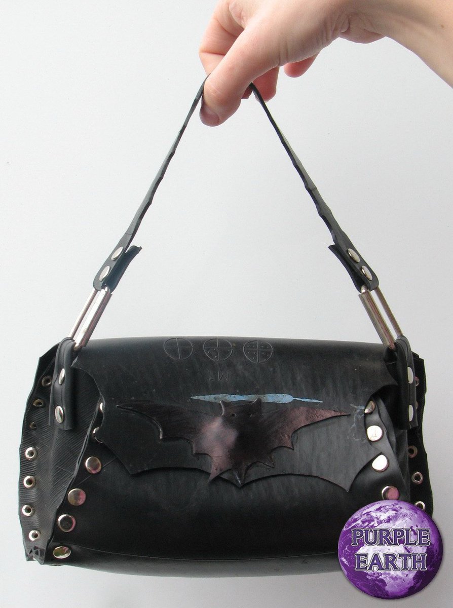 Beautifully designed black up-cycled inner tube small bag with stylish bat wings motif. Visit our Etsy shop to buy now!!!
#vegan #purpleearthcreations #upcycled #rubber #halloween #washable #durable #RE-TREADS #bat #tinybag #handbag