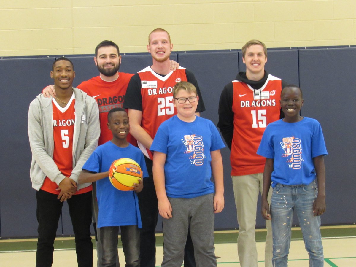 WFPSchools's tweet photo. We've been celebrating #NSLW18 all week at @WFPSchools! Thank you to @MSUM_MBB for volunteering as a celebrity servers for #schoollunch at Osgood ES! They even managed to find a few minutes to shoot some hoops! 🏀 #wfpschools #districtofchoice #DragonFamily https://t.co/au6d2vck6Y