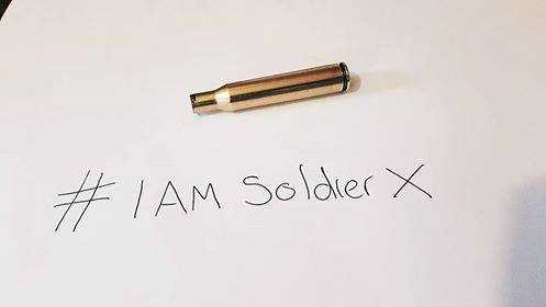 IAmSoldierXUK's tweet photo. Stand with #IAmSoldierX, the British soldier discharged for appearing in a selfie with Tommy Robinson, by sending your photos to Soldier@TheRebel.Media and sign the petition at https://t.co/eElBrX3nOq. https://t.co/ZkmYq8fFVR