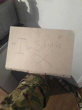 IAmSoldierXUK's tweet photo. Stand with #IAmSoldierX, the British soldier discharged for appearing in a selfie with Tommy Robinson, by sending your photos to Soldier@TheRebel.Media and sign the petition at https://t.co/eElBrX3nOq. https://t.co/VS6pKAgmAc