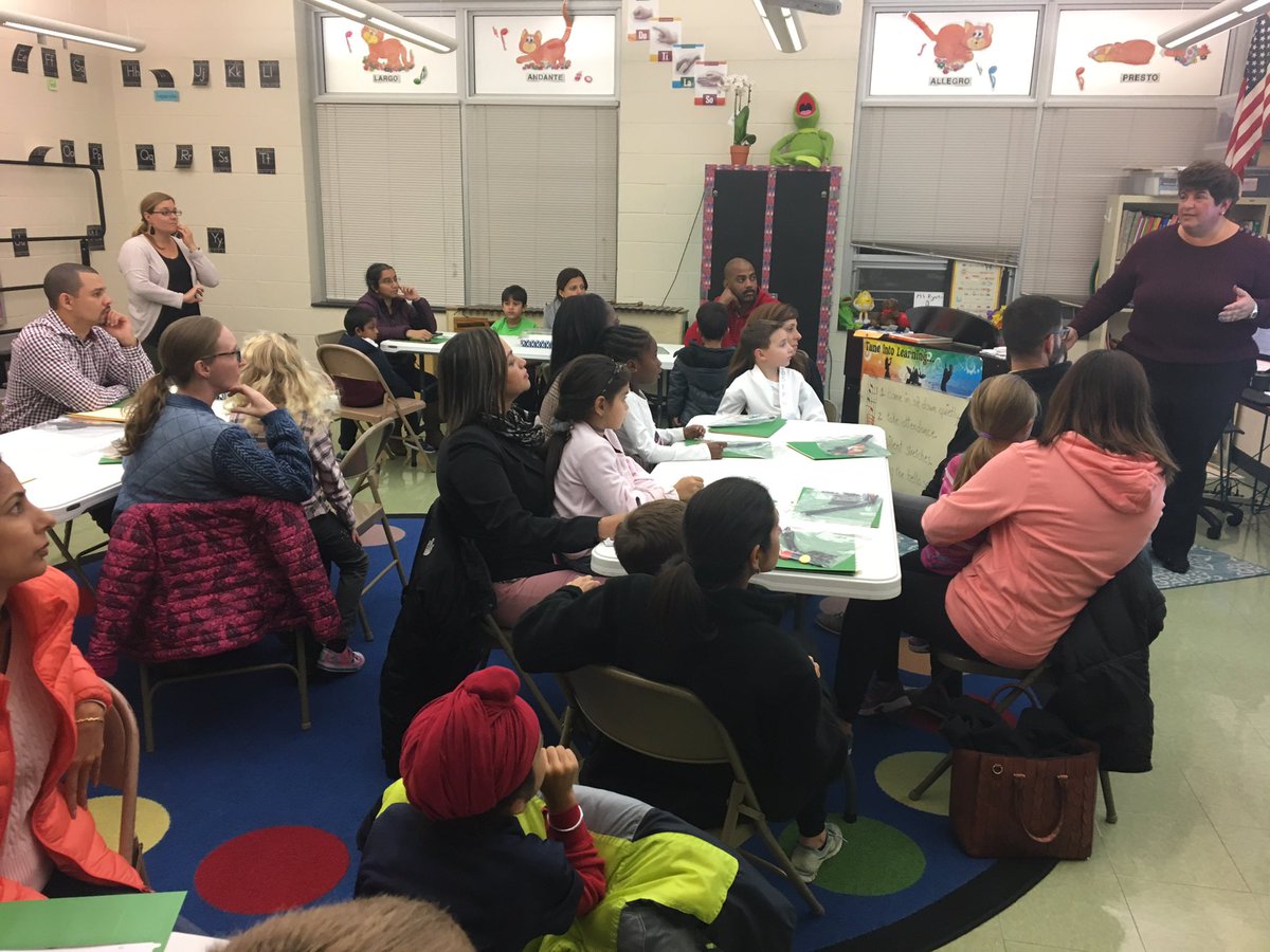 EBProfLearn's tweet image. A fun night at First Grade Family Night for all @EBPublicSchools families. Parents learn about how children learn to read and do math while their children “play.”