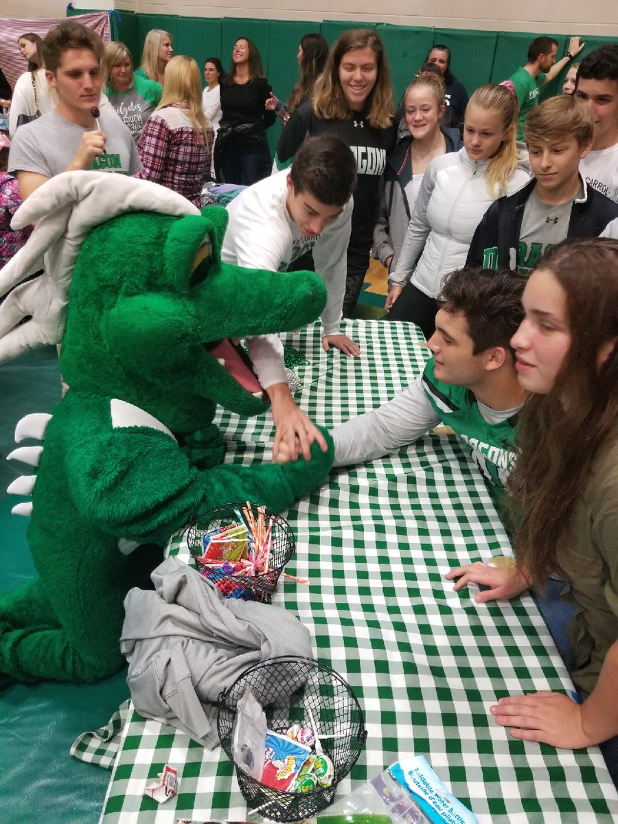 DragonWrestling's tweet photo. Even Charlie the Dragon took his shot at “Wrestling a wrestler” tonight at the Homecoming Carnival! The weather can’t hold Dragons down! Great to see so many people out enjoying the night! https://t.co/Zq1duTUpWx