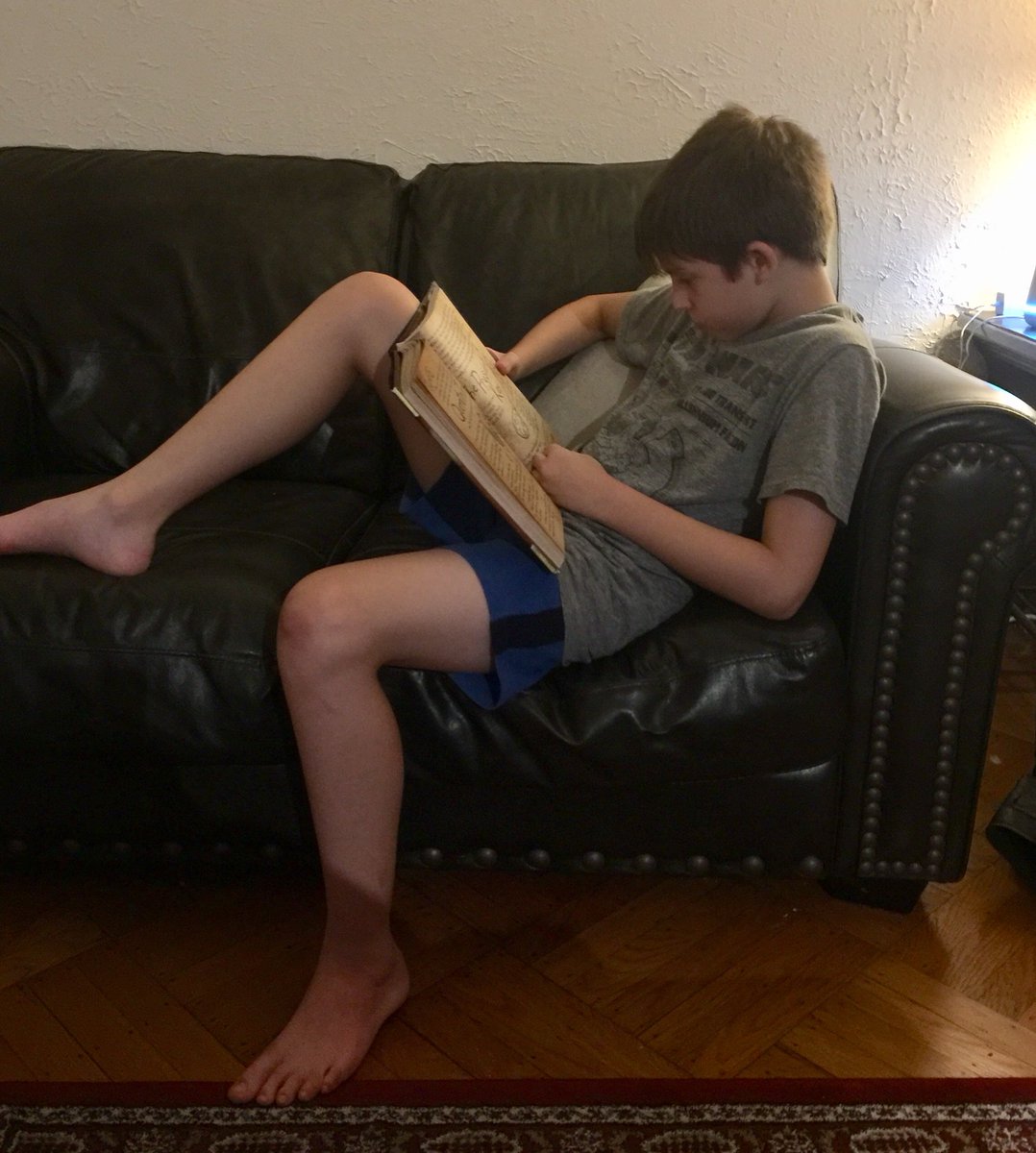 Mwolve1's tweet image. My son taking a reading break before bed.  #csdreads #csdelkinspark 6th grade