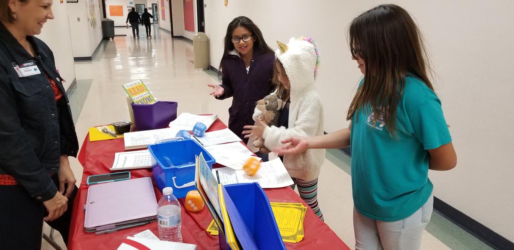zeila_wittke's tweet photo. Fun Reading and Math dice games giveaway during parent night. #trueexplorers @REL_Washington https://t.co/6Bcf5xBslz