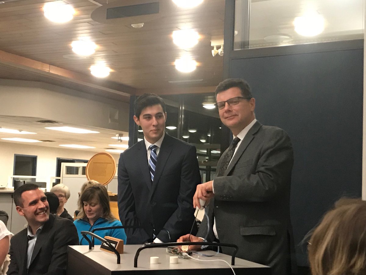 Sup ⁦<a href="/DaveWEberwein/">Dave Eberwein</a>⁩ learning from ⁦<a href="/sd63schools/">SD 63 Saanich</a>⁩ student and International Science Fair winner Nicolas Fedrigo at tonight’s board meeting.