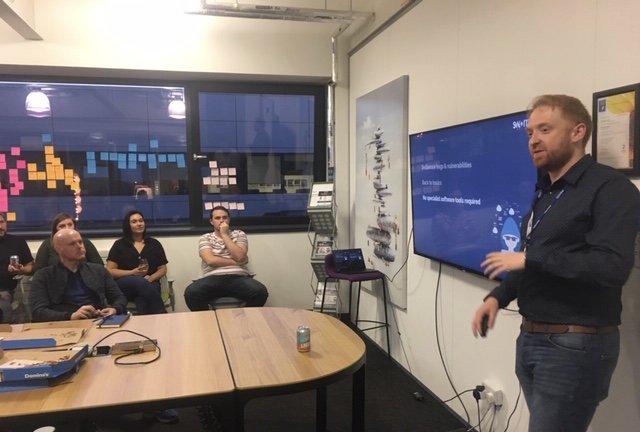 SwarmOnline's tweet photo. We had a great evening yesterday at our offices in Glasgow with a group of @CodeClanScot students! Beer, pizza and a talk from our Technical Director Jake on building secure software and the story behind our #HackTheHive competition. Read more here https://t.co/RhbqY6eGlR https://t.co/ogwp6a89vH