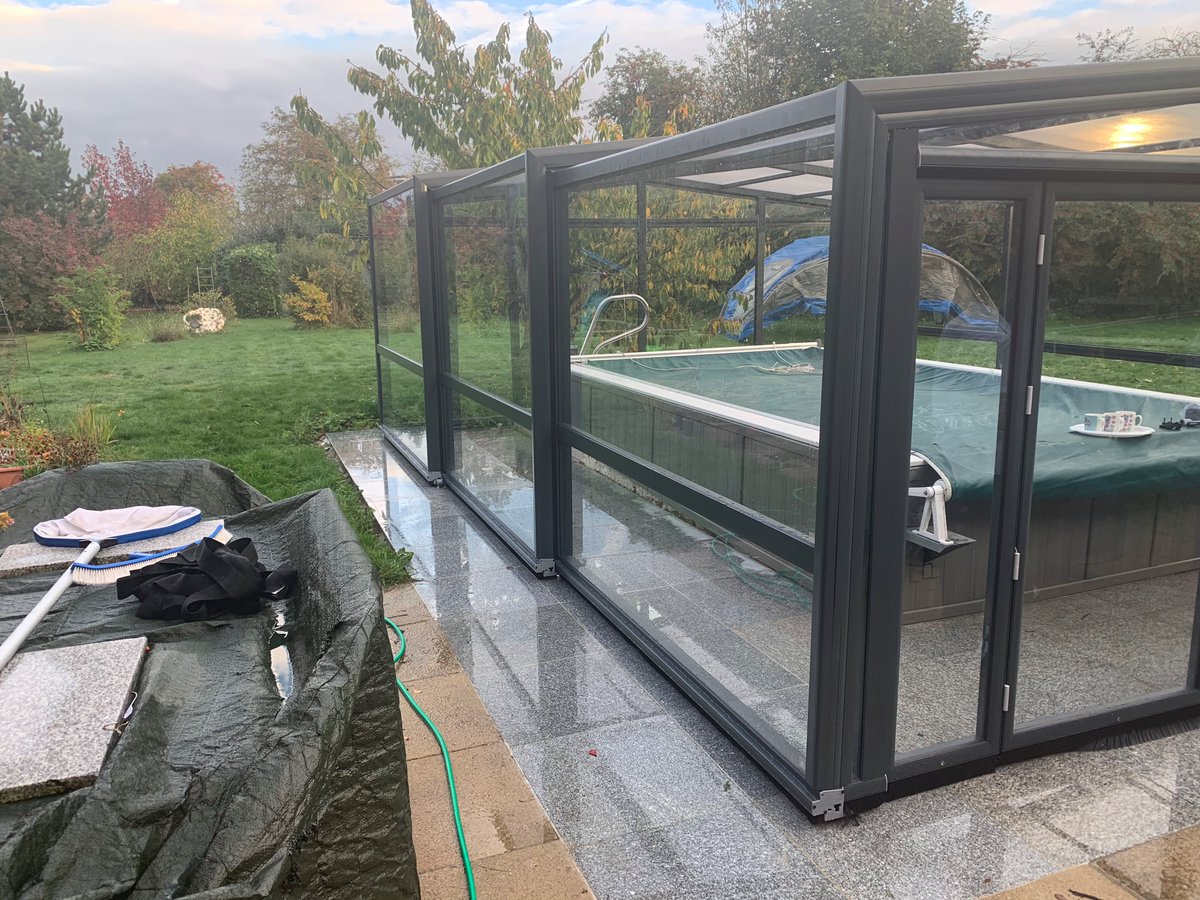 SummitLeisure's tweet image. A cute retractable glass sliding cover now providing a shelter for this pool. The bifold doors open up to provide great ventilation when needed. Rolling back off the pool to provide an open air pool when the weather is good. #endlesspool #poolcover #poolsafetycover #exercisepool